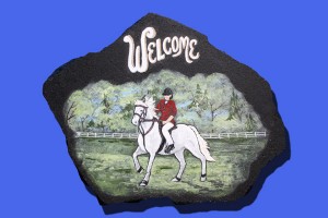 RIDER ON HORSE WELCOME STONE